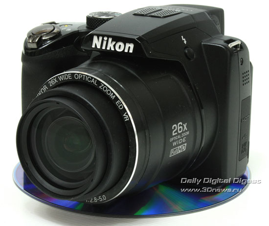  Nikon Coolpix P100. Вид общий. Объектив в крайнем ШУ-положении 