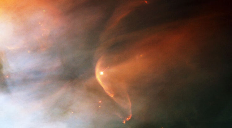  Головная ударная волна (передняя граница гелиосферы) у молодой звезды. Источник изображения: NASA/ESA/Hubble Heritage Team/STScI/AURA 