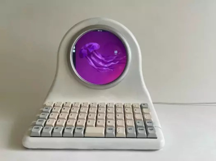 An enthusiast has built a retro-style computer equipped with a 5-inch round display