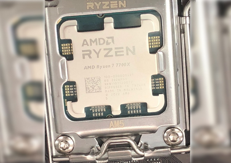 Eight-core AMD Ryzen 7 7700X processor shown in photo