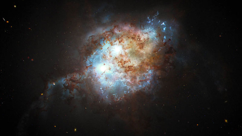  Двойной квазар в представлнии художника. Источник изображения: NASA, ESA, Joseph Olmsted (STScI) 